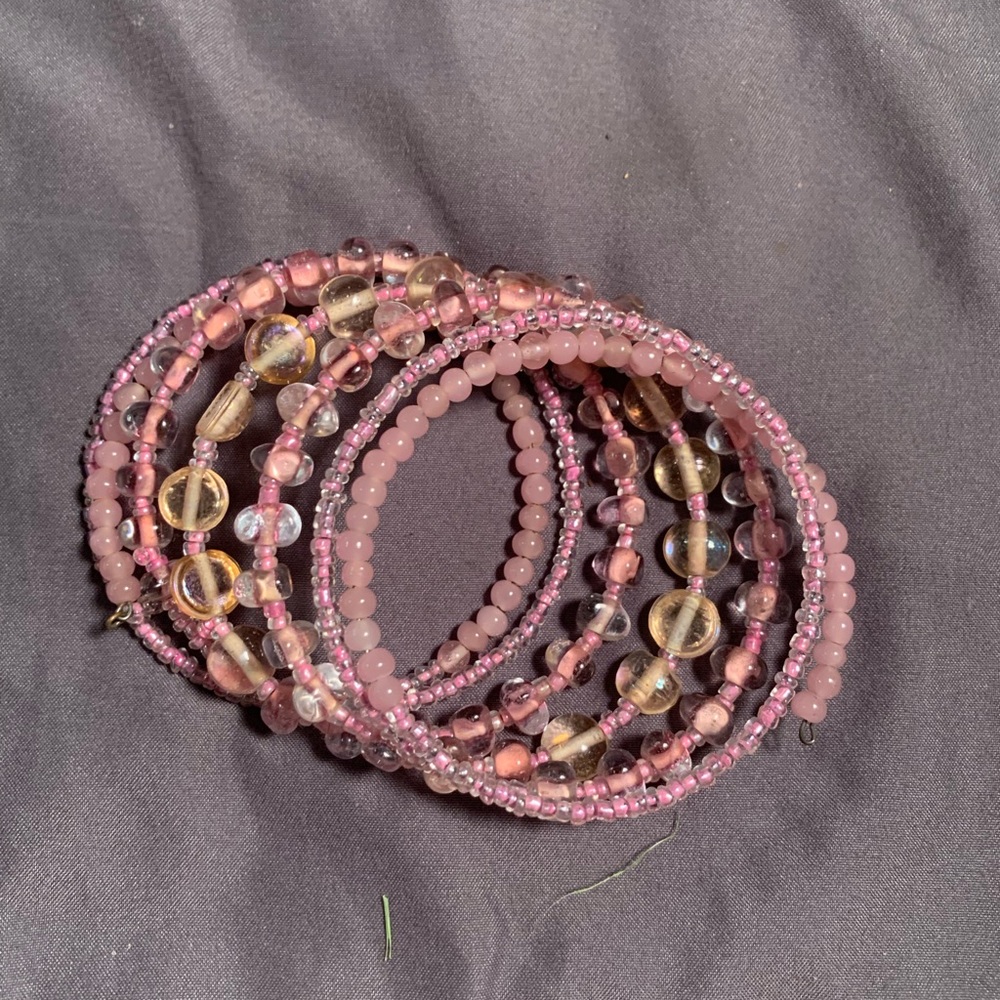 Pink wrap bracelet.